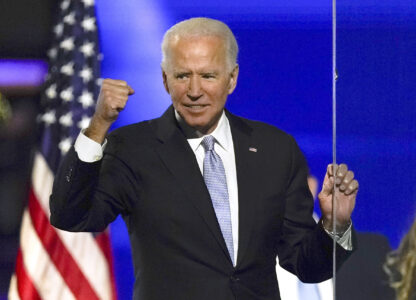 FILE - President-elect Joe Biden gestures to supporters Nov. 7, 2020, in Wilmington, Del. (AP Photo/Andrew Harnik, File)