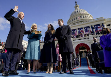 FILE - Joe Biden, from left, is sworn in as the 46th president of the United States as Jill Biden holds the Bible during the 59th Presidential Inauguration at the U.S. Capitol in Washington, Jan. 20, 2021, as their children Ashley Biden and Hunter Biden watch. (AP Photo/Andrew Harnik, Pool)