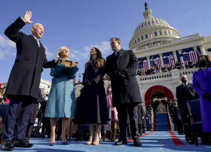 FILE - Joe Biden, from left, is sworn in as the 46th president of the United States as Jill Biden holds the Bible during the 59th Presidential Inauguration at the U.S. Capitol in Washington, Jan. 20, 2021, as their children Ashley Biden and Hunter Biden watch. (AP Photo/Andrew Harnik, Pool)