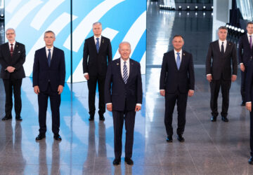 FILE - NATO Secretary General Jens Stoltenberg, second left, and U.S President Joe Biden, center, pose with other leaders during a family picture at the NATO headquarters where the 30-nation alliance hopes to reaffirm its unity and discuss increasingly tense relations with China and Russia, as the organization pulls its troops out after 18 years in Afghanistan, June, 14, 2021. (Jacques Witt, Pool via AP, File)