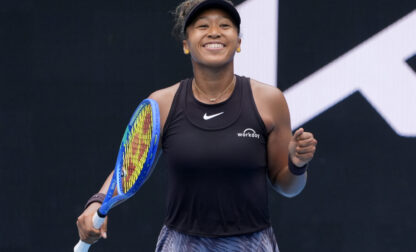 Naomi Osaka of Japan celebrates after defeating Karolina Muchova of the Czech Republic in their second round match at the Australian Open tennis championship in Melbourne, Australia, Wednesday, Jan. 15, 2025. (AP Photo/Asanka Brendon Ratnayake)