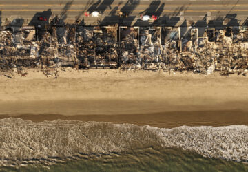 An aerial view shows the devastation by the Palisades Fire Thursday, Jan. 16, 2025 in Malibu, Calif. (AP Photo/Jae C. Hong)