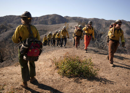 Fire crews work the burn zone of the Palisades Fire in Mandeville Canyon Thursday, Jan. 16, 2025, in Los Angeles. (AP Photo/Jae C. Hong)