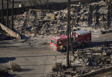 The Pacific Palisades Bowl Mobile Estates destroyed by the Palisades Fire is seen in the Pacific Palisades neighborhood of Los Angeles, Thursday, Jan. 16, 2025. (AP Photo/Damian Dovarganes)