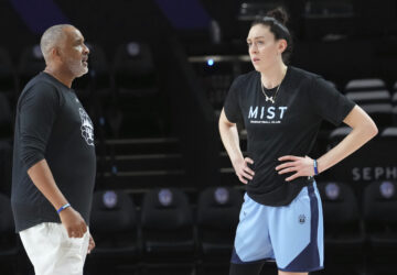 Mist player Breanna Stewart talks to head coach Phil Handy during a practice session, Thursday, Jan. 16, 2025, in Medley, Fla. (AP Photo/Marta Lavandier)