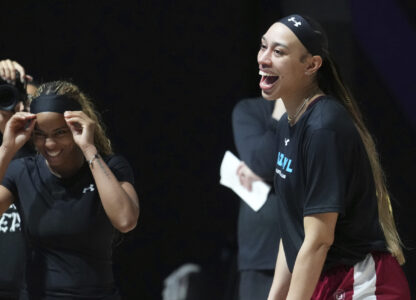 Vinyl's Dearica Hamby, right, and Jordin Canada, smiles during a practice session, Thursday, Jan. 16, 2025, in Medley, Fla., as the new 3-on-3 women's basketball league Unrivaled tips off this weekend. (AP Photo/Marta Lavandier)