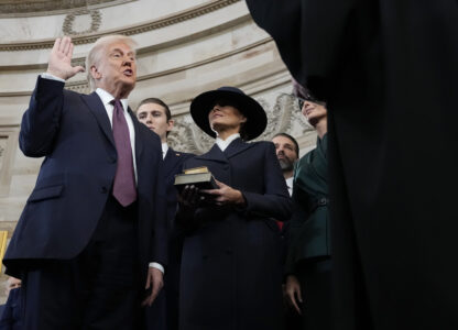 Donald Trump is sworn in as the 47th president of the United States by Chief Justice John Roberts as Melania Trump holds the Bible during the 60th Presidential Inauguration in the Rotunda of the U.S. Capitol in Washington, Monday, Jan. 20, 2025. (AP Photo/Morry Gash, Pool)