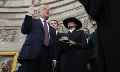 Donald Trump is sworn in as the 47th president of the United States by Chief Justice John Roberts as Melania Trump holds the Bible during the 60th Presidential Inauguration in the Rotunda of the U.S. Capitol in Washington, Monday, Jan. 20, 2025. (AP Photo/Morry Gash, Pool)