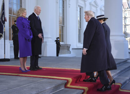 President Joe Biden, center left, and first lady Jill Biden, left, greet President-elect Donald Trump, center right, and Melania Trump, right, upon arriving at the White House, Monday, Jan. 20, 2025, in Washington. (AP Photo/Evan Vucci)