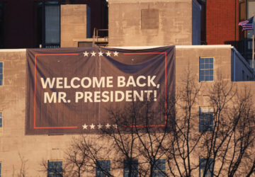 A sign is seen near St. John's Episcopal Church across from the White House in Washington, Monday, Jan. 20, 2025, where President-elect Donald Trump and his wife Melania will attend an early morning service to start Trump's inauguration day. (AP Photo/Matt Rourke)