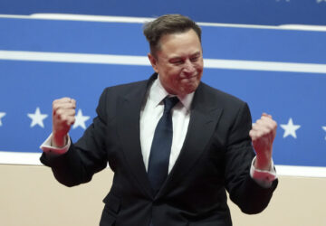 Elon Musk arrives to speak at an indoor Presidential Inauguration parade event in Washington, Monday, Jan. 20, 2025. (AP Photo/Matt Rourke)