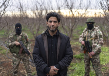 Nassim Abu Ara, known as Abu Murshid, a rebel leader, poses for a portrait during an interview with the Associated Press, in Nawa, near Daraa, Syria, Jan. 4, 2025. (AP Photo/Mosa'ab Elshamy)