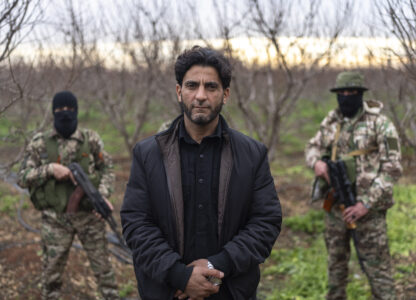 Nassim Abu Ara, known as Abu Murshid, a rebel leader, poses for a portrait during an interview with the Associated Press, in Nawa, near Daraa, Syria, Jan. 4, 2025. (AP Photo/Mosa'ab Elshamy)