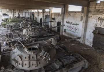 Tanks that belonged to the Assad government sit parked in a warehouse, in Nawa, near Daraa, Syria, Jan. 4, 2025. (AP Photo/Mosa'ab Elshamy)