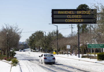 Access to the Ravenel Bridge on U.S. Highway 17 is blocked after a winter storm dropped ice and snow Wednesday, Jan. 22, 2025, on Mt. Pleasant, S.C. (AP Photo/Mic Smith)