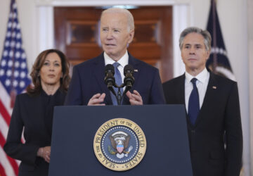 FILE - President Joe Biden, center, with Vice President Kamala Harris, left, and Sec. of State Anthony Blinken, right, speaks at the White House on the announcement of a ceasefire deal in Gaza after more than 15 months of war, Jan. 15, 2025, in Washington. (AP Photo/Evan Vucci, File)