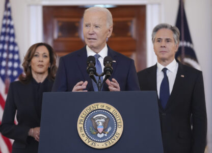 FILE - President Joe Biden, center, with Vice President Kamala Harris, left, and Sec. of State Anthony Blinken, right, speaks at the White House on the announcement of a ceasefire deal in Gaza after more than 15 months of war, Jan. 15, 2025, in Washington. (AP Photo/Evan Vucci, File)