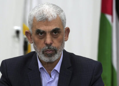 FILE - Yahya Sinwar, head of Hamas in Gaza, chairs a meeting with leaders of Palestinian factions at his office in Gaza City, April 13, 2022. (AP Photo/Adel Hana, File)