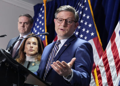 House Speaker Mike Johnson, R-La., center, joined from left by Rep. Jeff Hurd, R-Colo., and Republican Conference Chair Lisa McClain, R-Mich., during a news conference at the Republican National Committee headquarters in Washington, Wednesday, Jan. 22, 2025. (AP Photo/J. Scott Applewhite)