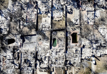 Residences destroyed by the Eaton Fire line a neighborhood in Altadena, Calif., on Tuesday, Jan. 21, 2025. (AP Photo/Noah Berger)