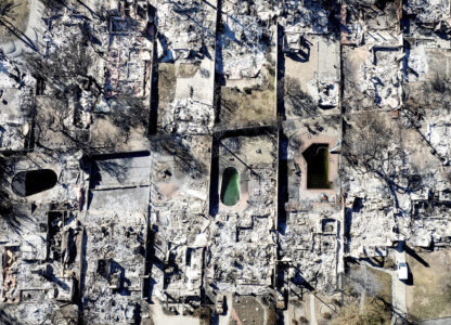 Residences destroyed by the Eaton Fire line a neighborhood in Altadena, Calif., on Tuesday, Jan. 21, 2025. (AP Photo/Noah Berger)