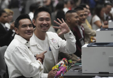 A couple from the LGBTQ+ community wait to sign their marriage certificates as the Marriage Equality Act takes effect in Bangkok, Thailand, Thursday, Jan. 23, 2025. (AP Photo/Sakchai Lalit)