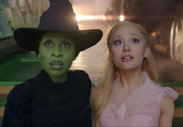 This image released by Universal Pictures shows Cynthia Erivo, left, and Ariana Grande in a scene from the film 