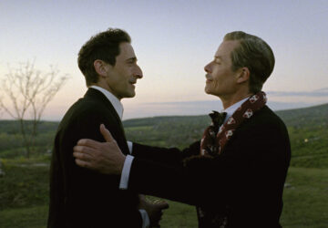 This image released by A24 shows Adrien Brody, left, and Guy Pearce in a scene from 