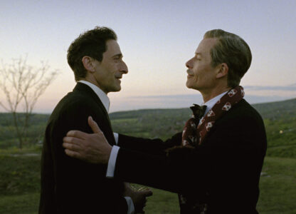 This image released by A24 shows Adrien Brody, left, and Guy Pearce in a scene from 