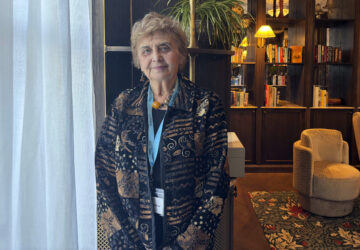 Tova Friedman, 86, who was imprisoned at Auschwitz as a little girl, poses for a photo ahead of commemorations on the 80th anniversary of the death camp's liberation, Sunday, Jan. 26. 2025, in Krakow, Poland. (AP Photo/Vanessa Gera)