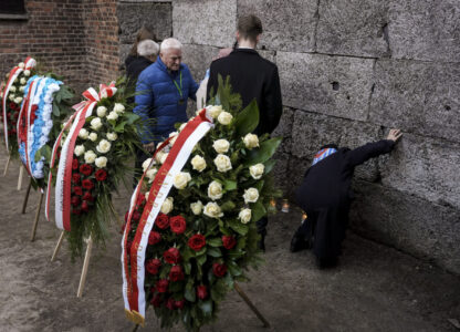 Survivors and relatives attend a ceremony at the Auschwitz-Birkenau former Nazi German concentration and extermination camp, in Oswiecim, Poland, Monday, Jan. 27. 2025.(AP Photo/Oded Balilty)