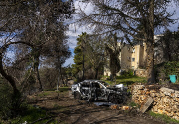 A car heavily damaged during the 14-month war between Hezbollah and Israel in Kibbutz Manara, on the border with Lebanon, northern Israel, Jan. 5, 2025. (AP Photo/Ariel Schalit)