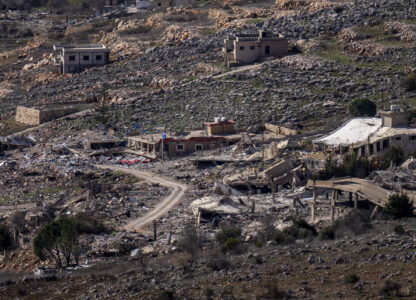 The heavy damage from the 14-month war between Hezbollah and Israel in southern Lebanon village of Meiss el-Jabal can be seen from a house in Kibbutz Manara, on the border with Lebanon, in northern Israel, Jan. 5, 2025. (AP Photo/Ariel Schalit)