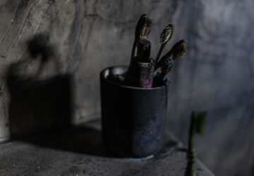 Tooth brushes left by a displaced family are seen burnt in their house heavily damaged from the 14-month war between Hezbollah and Israel in Kibbutz Manara, on the border with Lebanon, northern Israel, Jan. 5, 2025. (AP Photo/Ariel Schalit)