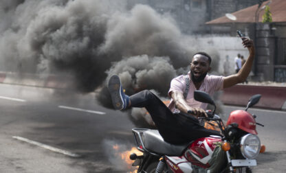 People protest in Kinshasa, Democratic Republic of the Congo Tuesday, Jan. 28, 2025, against the Rwanda-backed M23 rebels' advances into eastern Congo's capital Goma. (AP Photo/Samy Ntumba Shambuyi)