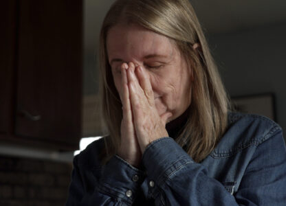 Barbara Teed unpacks a Meals on Wheels deliver for herself and her adult son Ryan, who has Down syndrome, on Wednesday, Jan. 29, 2025, in Bloomington, Minn. (AP photo/Mark Vancleave)