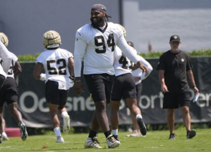 FILE - New Orleans Saints defensive end Cameron Jordan (94) walks on the field during an NFL OTA football practice in Metairie, La., June 5, 2024. (AP Photo/Gerald Herbert, File)