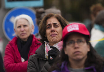 Relatives and supporters of hostages held by Hamas in the Gaza Strip protest outside the prime minister's office in Jerusalem on Tuesday, Feb. 11, 2025. after Hamas announced it would delay a planned hostage release after accusing Israel of violating a fragile ceasefire. (AP Photo/Ohad Zwigenberg)