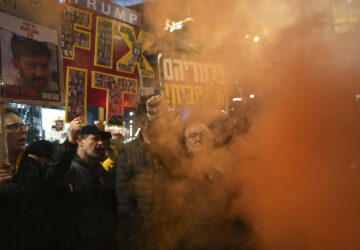 Relatives of hostages, held by Hamas in the Gaza Strip, protest in Tel Aviv, Monday, Feb. 10, 2025 after the militant group announced it would delay hostage releases in the Gaza Strip after accusing Israel of violating a fragile ceasefire. (AP Photo/Ohad Zwigenberg)