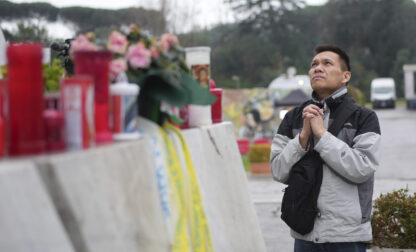 Hoang Phuc Nguyen, a Vietnamese pilgrim, prays for Pope Francis at the Agostino Gemelli Polyclinic, in Rome, Tuesday, Feb. 25, 2025 where Pope Francis is hospitalised since Friday, Feb. 14. (AP Photo/Alessandra Tarantino)