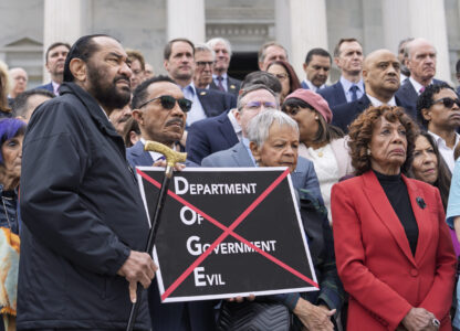 From left, Rep. Al Green, D-Texas, Rep. Kweisi Mfume, D-Md., Rep. Bonnie Watson Coleman, D-N.J., and Rep. Maxine Waters, D-Calif., join others as House Minority Leader Hakeem Jeffries, D-N.Y., speaks out against the Republican budget plan, on the House steps at the Capitol in Washington, Tuesday, Feb. 25, 2025. (AP Photo/J. Scott Applewhite)