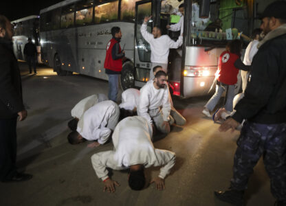 Freed Palestinian prisoners react as they arrive in the Gaza Strip after being released from an Israeli prison following a ceasefire agreement between Hamas and Israel in Khan Younis, Gaza Strip, Thursday, Feb. 27, 2025. (AP Photo/Jehad Alshrafi)