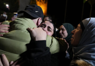 Palestinian prisoners are greeted after being released from Israeli prison following a ceasefire agreement between Israel and Hamas, in the West Bank city of Ramallah, Thursday, Feb. 27, 2025. (AP Photo/Nasser Nasser)