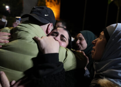 Palestinian prisoners are greeted after being released from Israeli prison following a ceasefire agreement between Israel and Hamas, in the West Bank city of Ramallah, Thursday, Feb. 27, 2025. (AP Photo/Nasser Nasser)