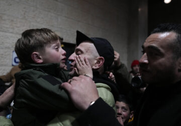 Palestinian prisoners are greeted after being released from Israeli prison following a ceasefire agreement between Israel and Hamas, in the West Bank city of Ramallah, Thursday, Feb. 27, 2025. (AP Photo/Nasser Nasser)