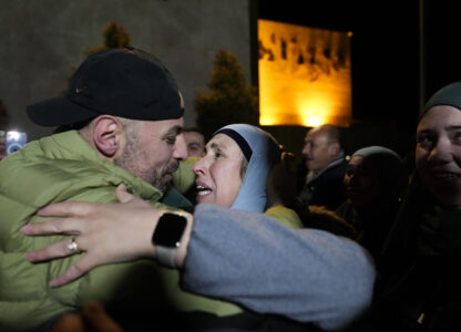 Palestinian prisoners are greeted after being released from Israeli prison following a ceasefire agreement between Israel and Hamas, in the West Bank city of Ramallah, Thursday, Feb. 27, 2025. (AP Photo/Nasser Nasser)