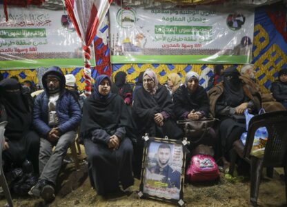 Relatives and friends of Palestinian prisoners to be released from Israeli prison wait for their arrival in Khan Younis, southern Gaza Strip, late Wednesday, Feb. 26, 2025. (AP Photo/Jehad Alshrafi)