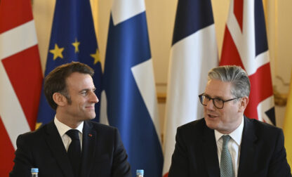 Britain's Prime Minister Keir Starmer, right, and France's President Emmanuel Macron at the European leaders' summit to discuss Ukraine, at Lancaster House, London, Sunday March 2, 2025. (Justin Tallis/Pool via AP)