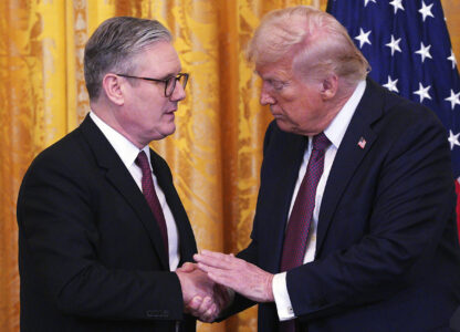 Britain's Prime Minister Keir Starmer, left, and U.S. President Donald Trump shake hands at a joint press conference in the East Room at the White House Thursday, Feb. 27, 2025, in Washington. (Carl Court/Pool Photo via AP)