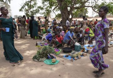 Women sell their goods at Nzara open market in Nzara, South Sudan on Saturday, Feb. 15, 2025. (AP Photo/Brian Inganga)